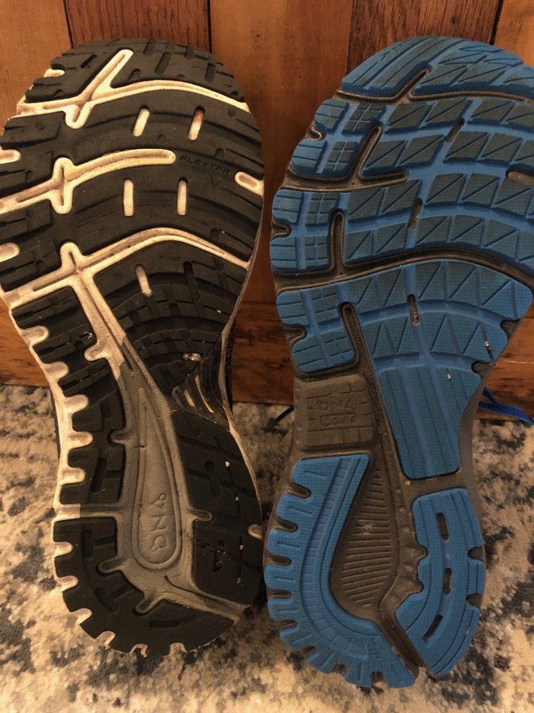 Soles of two running shoes