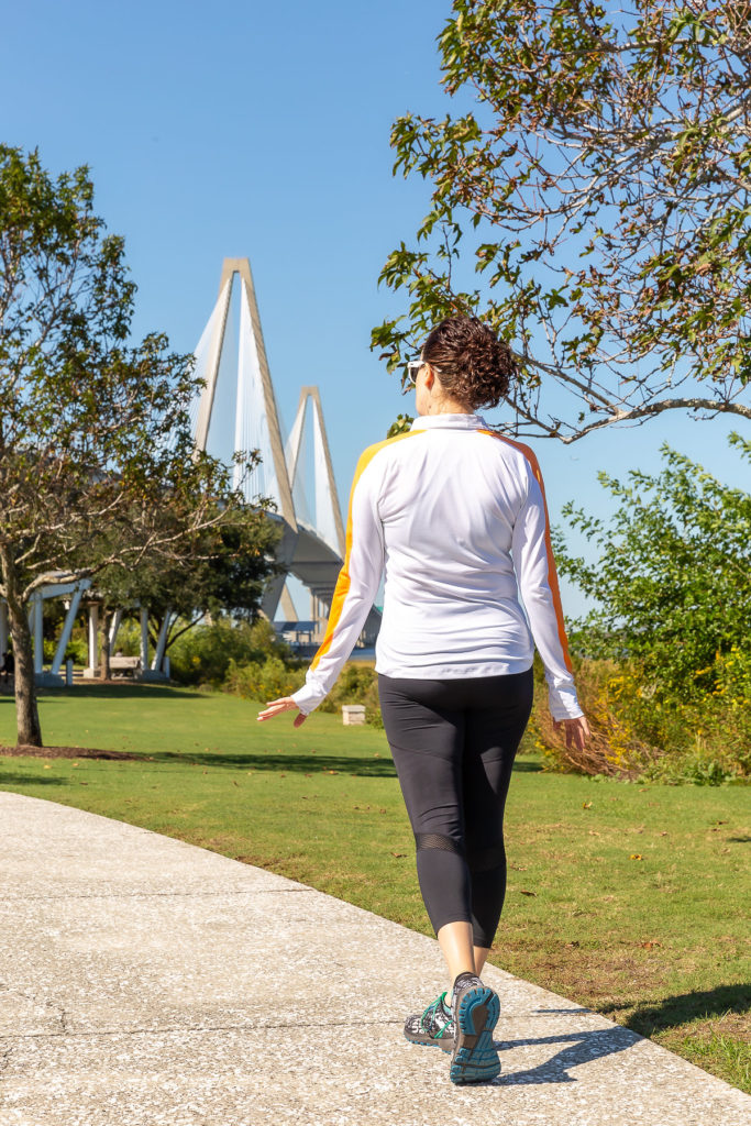 Women walking away from camera in the park