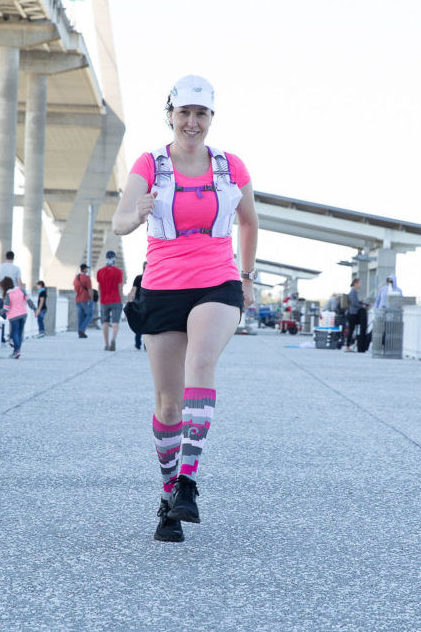 woman running toward camera