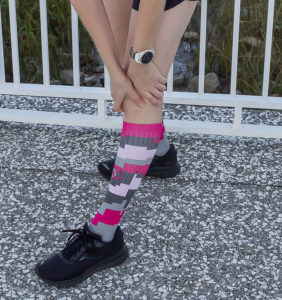 Runner showing off compression socks